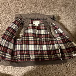 Brown plaid puffer vest. Women’s xs girls XL