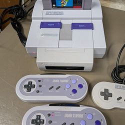 Super Nintendo SNES With 2 Wireless Acclaim Controllers And One Regular Controller With Super Mario World 