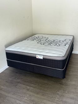 Queen size mattress pillow top 12” thick.     New mattress in a plastic sealed