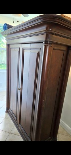 Solid wood dresser/ cabinet,  armor