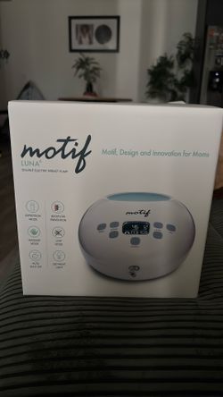 New open box Motif breast pump