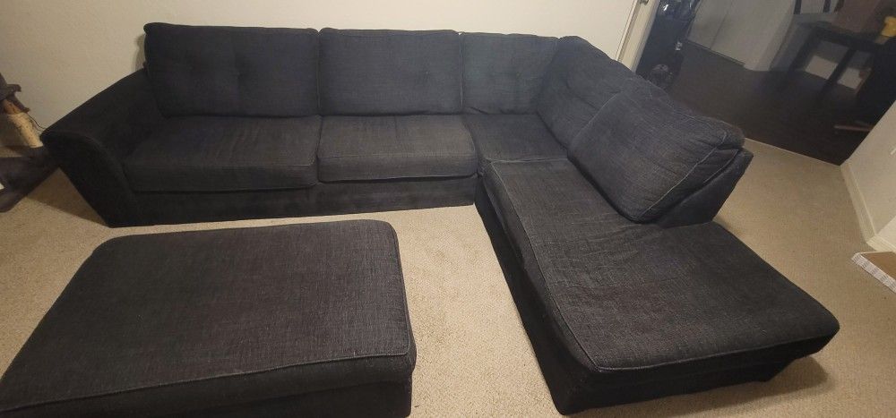Black Sectional with Ottoman for $850, Negotiable/OBO!