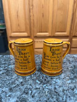 Vintage Ceramic Irish Toast Pair of Salt and Pepper shakers.  Size appropriately 3 1/2 inches tall.  Preowned.  Has been on display in a cabinet with 