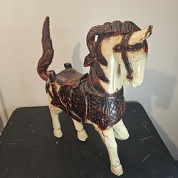 Large hand carved wooden horse