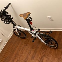 Brand New Folding Bike16 Inch Wheels Bike Transforms Into A Rolling Dolly That You Can Pull Or Push To A Airport Onto A Subway Car Or Marta Bus. This 