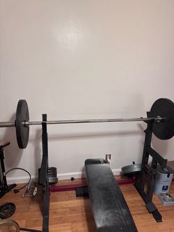 Adjustable squat rack / bench