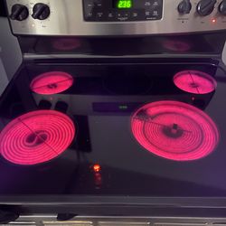 GE stainless stainless glass top perfect condition