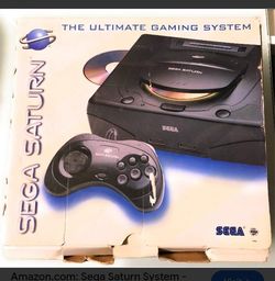 Sega Saturn game console with 5 games