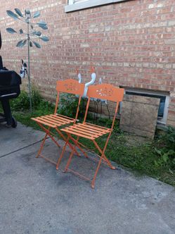 Orange Alpine Corporation metal Bistro Chairs W/ floral Leaf Pattern & Fold for easy storage