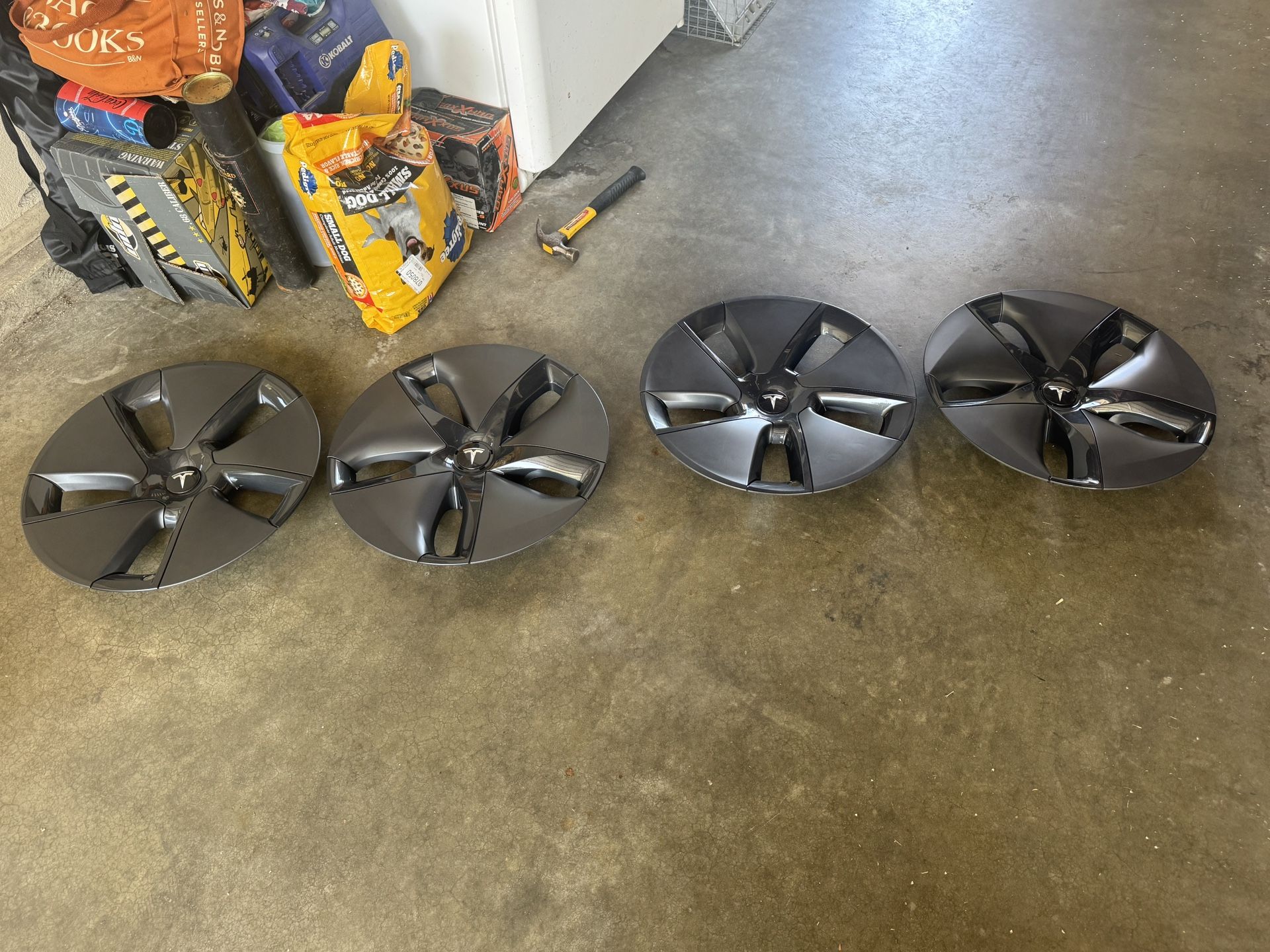 4 Tesla Aero Covers $75. One year old. Put on new rims don't need them anymore
