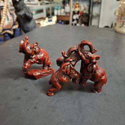 Cinnebar Red Resin Set Of 3 Mini Elephant Figurines 2 Attached At Their Trunks Fighting While A 3RD Watches- All W/Trunks Up 3.25"H