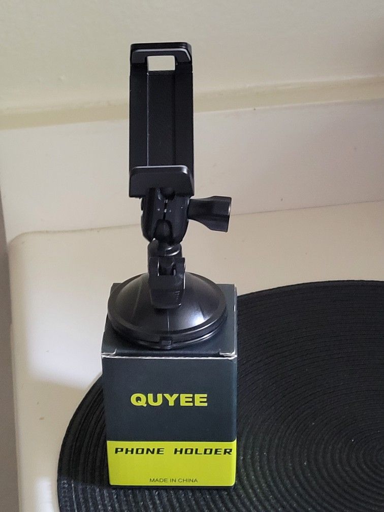 NEW In Box QUYEE PHONE HOLDER (Mouts To Mirrors Glass Strong Hold)