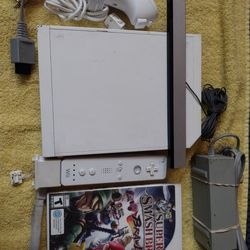 Nintendo Wii good shape works good complete with game no offers no trades 75th Ave Indian School serious buyers only please