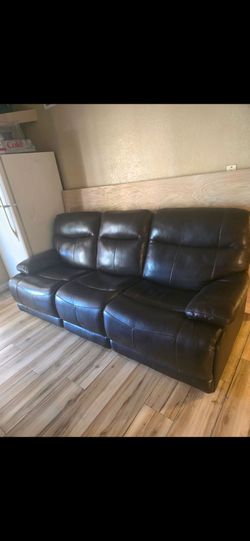 Brown leather power reclining sofa