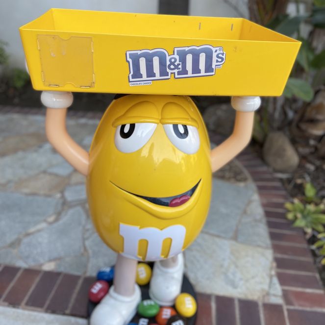 YELLOW M&M DISPLAY WITH TRAY for Sale in San Diego, CA - OfferUp