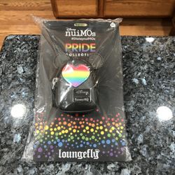 Loungefly nuiMOs Small pride collection Rainbow Backpack. Perfect for a change purse.  Brand new on original packaging .  Size 3 3/4 inches long.  Smo