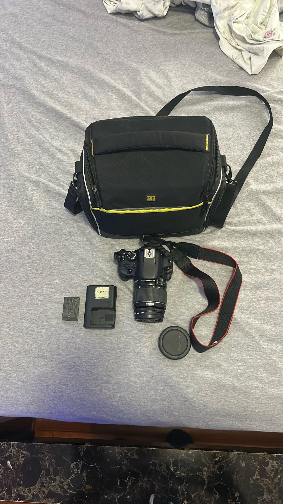 Canon Camera With Lens Battery Charger, And Bag