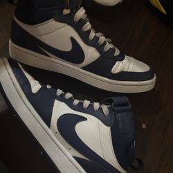 blue and white nike mids