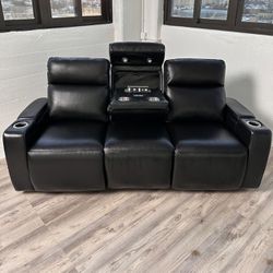 New Pair Of Renaissance leather power reclining sofa with drop down table   Retails for $1,699.99 EACH I’m selling the pair for $1,000