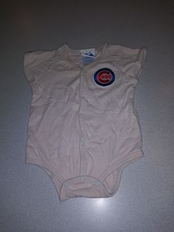 6/9 MONTH ONESIE FROM MAJESTIC WITH SEWN ON LOGO