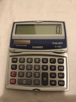 Casio SL-100L Solar Powered Dual Leaf Calculator Made In Japan ,Working Great.