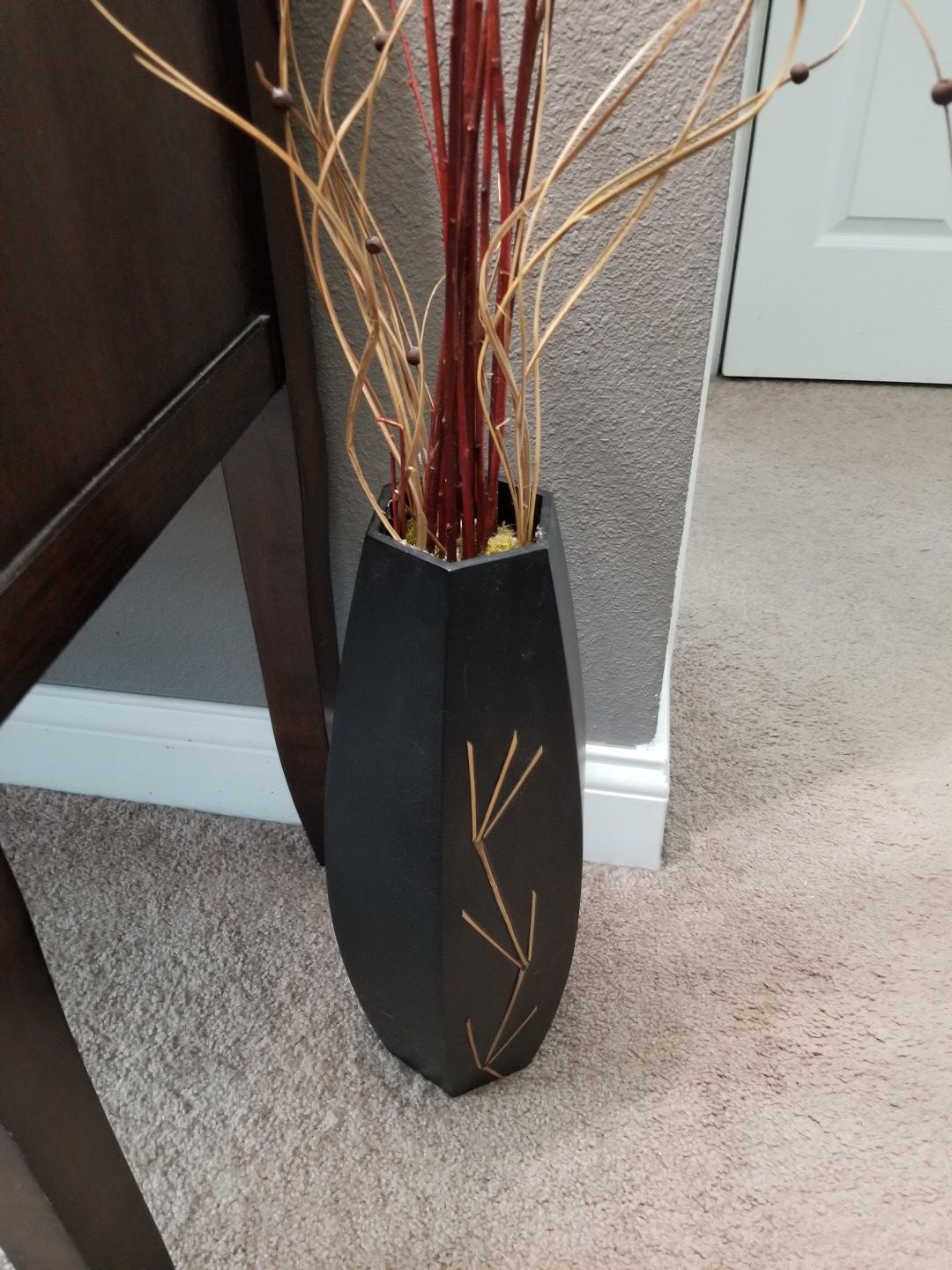 Decorative vase with branches
