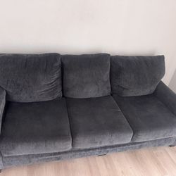 It’s a 2024 Sectional Grey granite Sofa 
