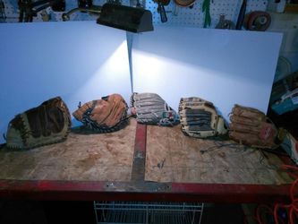 Lots of Junior baseball gloves..