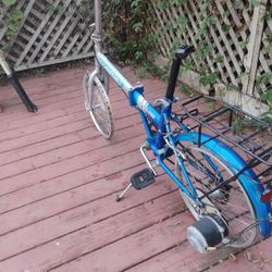 "Currie" Fold Up Electric Bike Has Motor And Throttle  Just Needs Batteries And Soilinoid And Tires Motor Works Good Need Gone $35