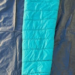 Kelty Sleeping Bag and Trekking Poles

- Large 29" x 80"