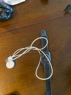 Apple Watch with Nike Sport Band and Charger