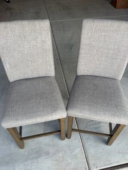 Two counter height chairs