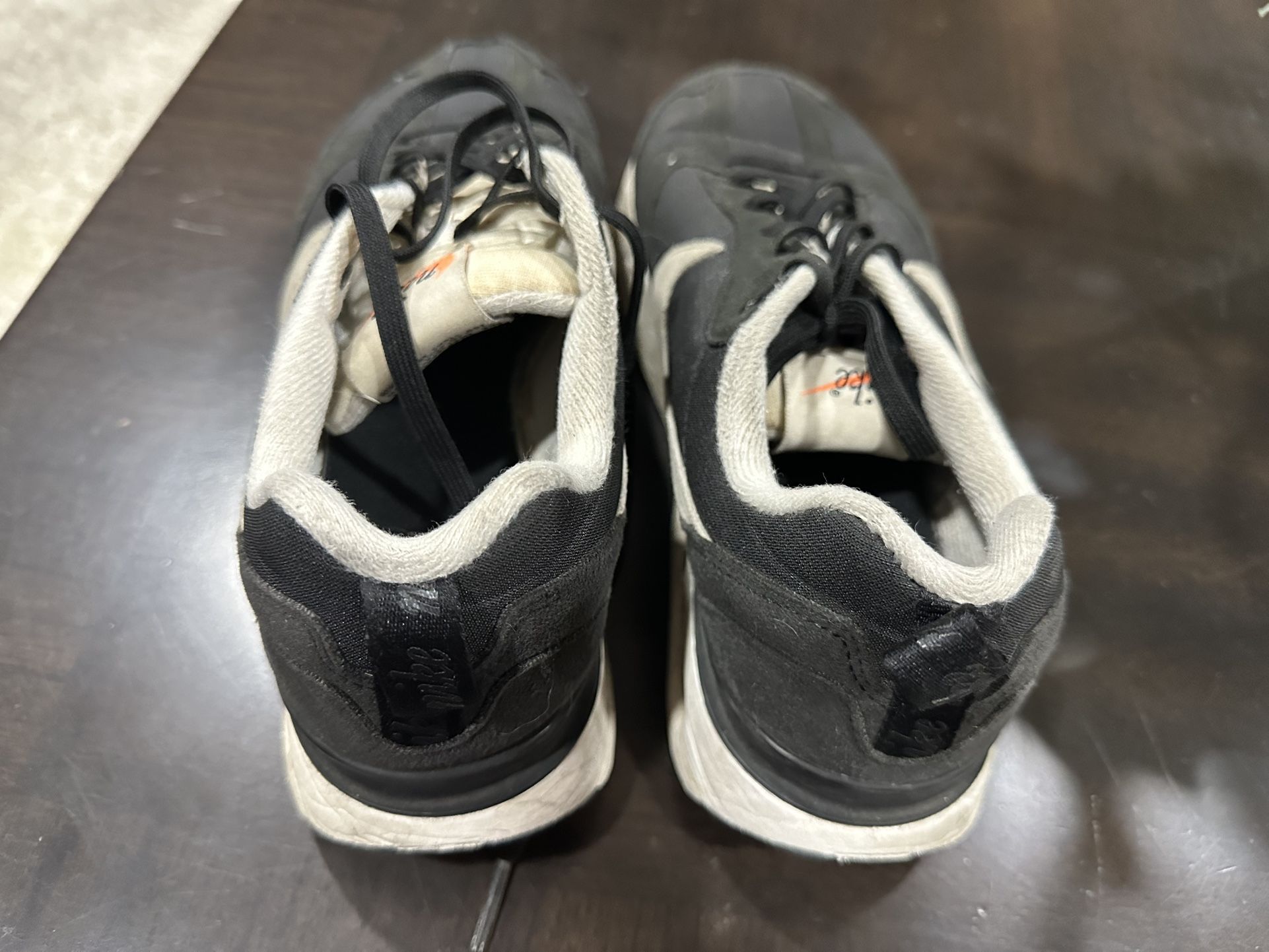 2 Nike Sneakers- 1 Black / 1 White Pair ( adult Size 7)