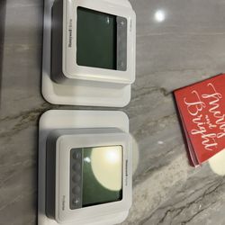 Two Programmable Thermostats