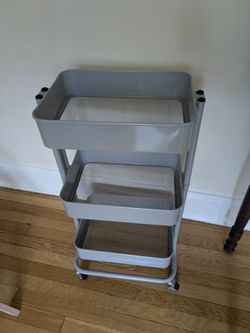 Grey rolly shelf