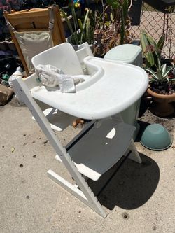 Highchair with tray and seat cover