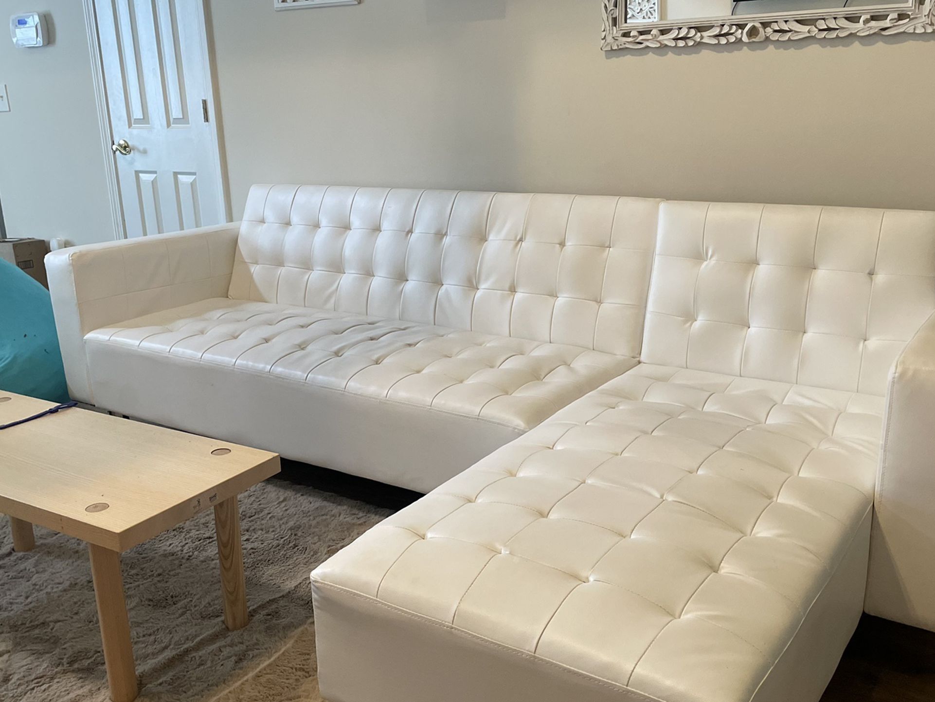 Nice White Leather Convertable  Sectionals