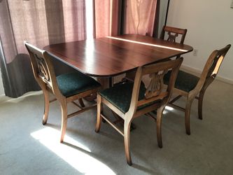 Wooden table with 4 chairs
