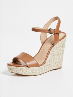 Michael Kors Jill brown leather espadrille wedge sandals featuring an adjustable ankle strap and a braided jute platform heel size 9.5
