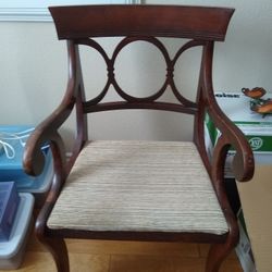 Two vintage Mahogany Duncan Phyfe dining arm chairs manufactured by Tell City furniture company in Indiana
