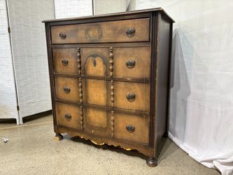 Antique Four Drawer Dresser with Decorative Front