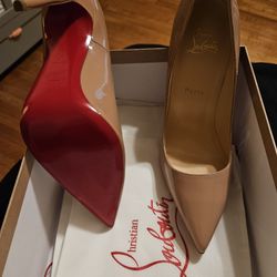 Christian Louboutin Red Bottoms.