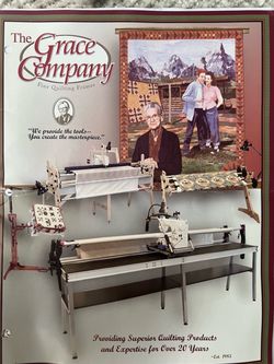 Long arm quilting frame with stitch regulator