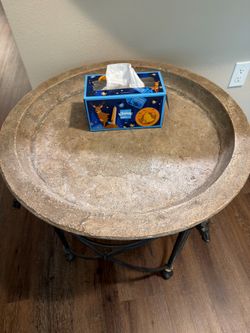 Stone and iron accent table
