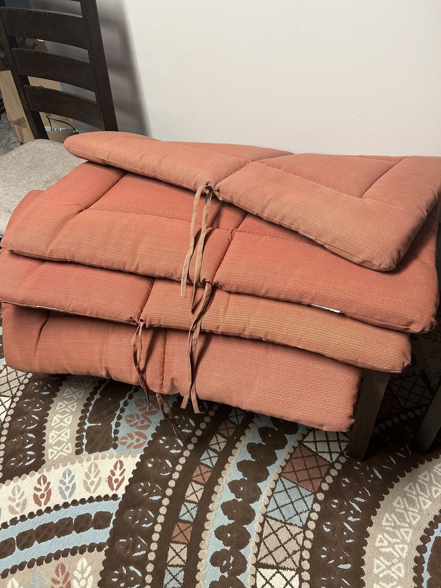 four chair cushions