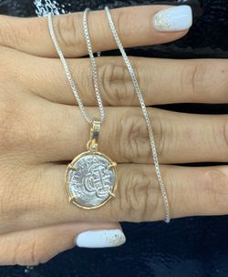 Atocha silver coin pendant In 14Kt gold bezel and silver chain 18”