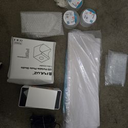 Label Printer And Extra Shipping Supplies.