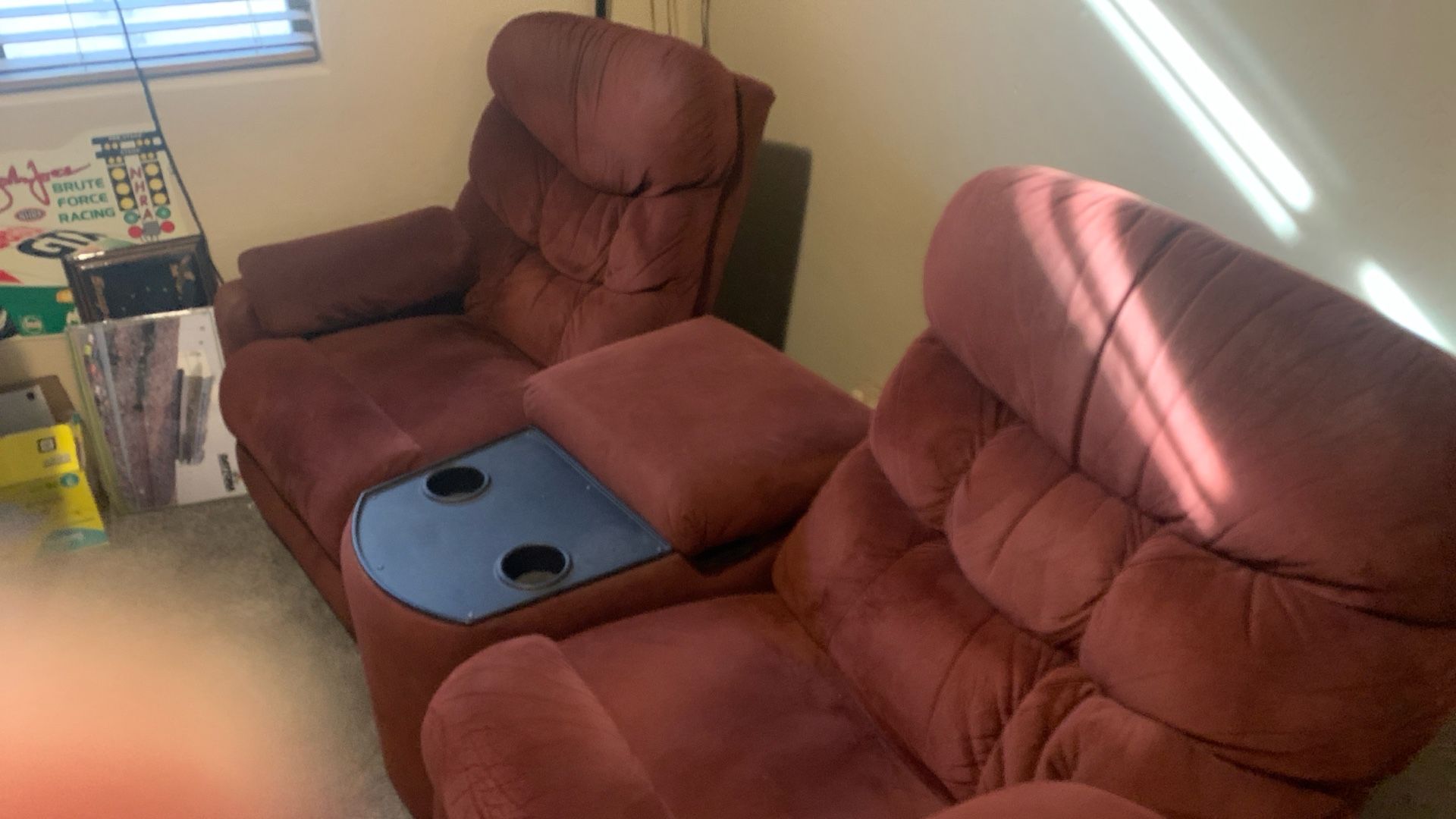 Two La-Z-Boy recliners with console