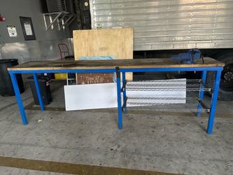 Iron and wood table, 10 feet long and 3 1/2 feet tall. $300.