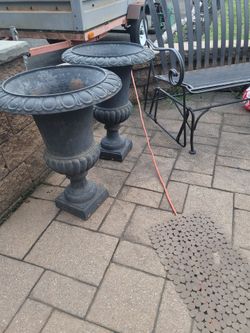 Pair of vintage cast iron pots
